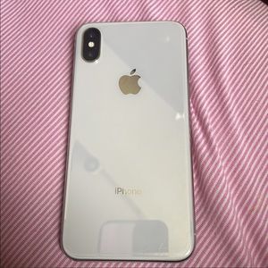 White 64GB Apple IPhone X. Great condition and refurbished. Comes with a charger